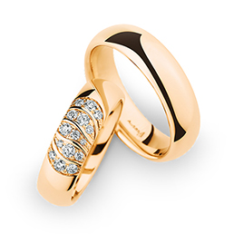 Обручальные кольца из абрикосового золота Christian Bauer