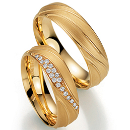 Обручальные кольца из абрикосового золота Fischer