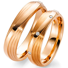 Обручальные кольца из абрикосового золота August Gerstner