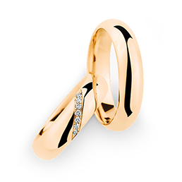 Обручальные кольца из абрикосового золота Christian Bauer